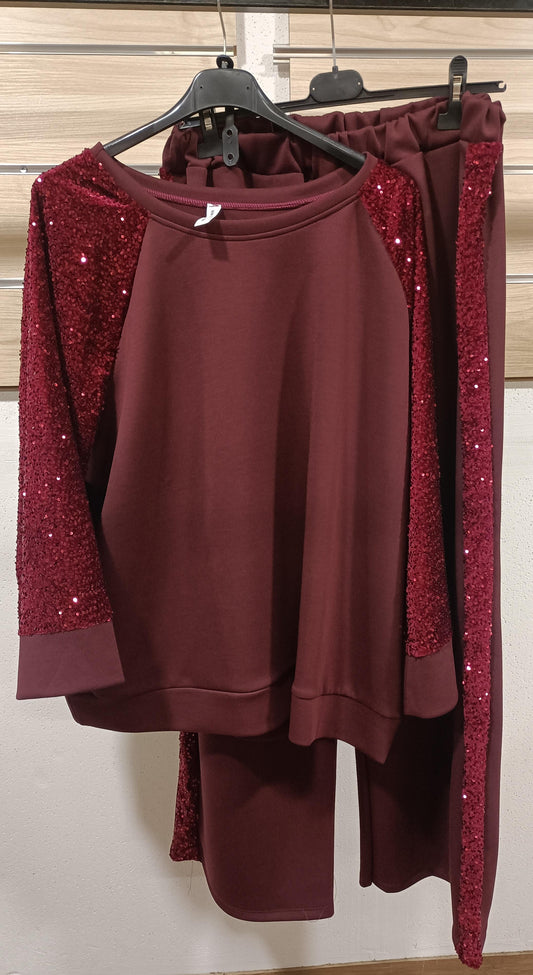Tuta con maniche paillettes