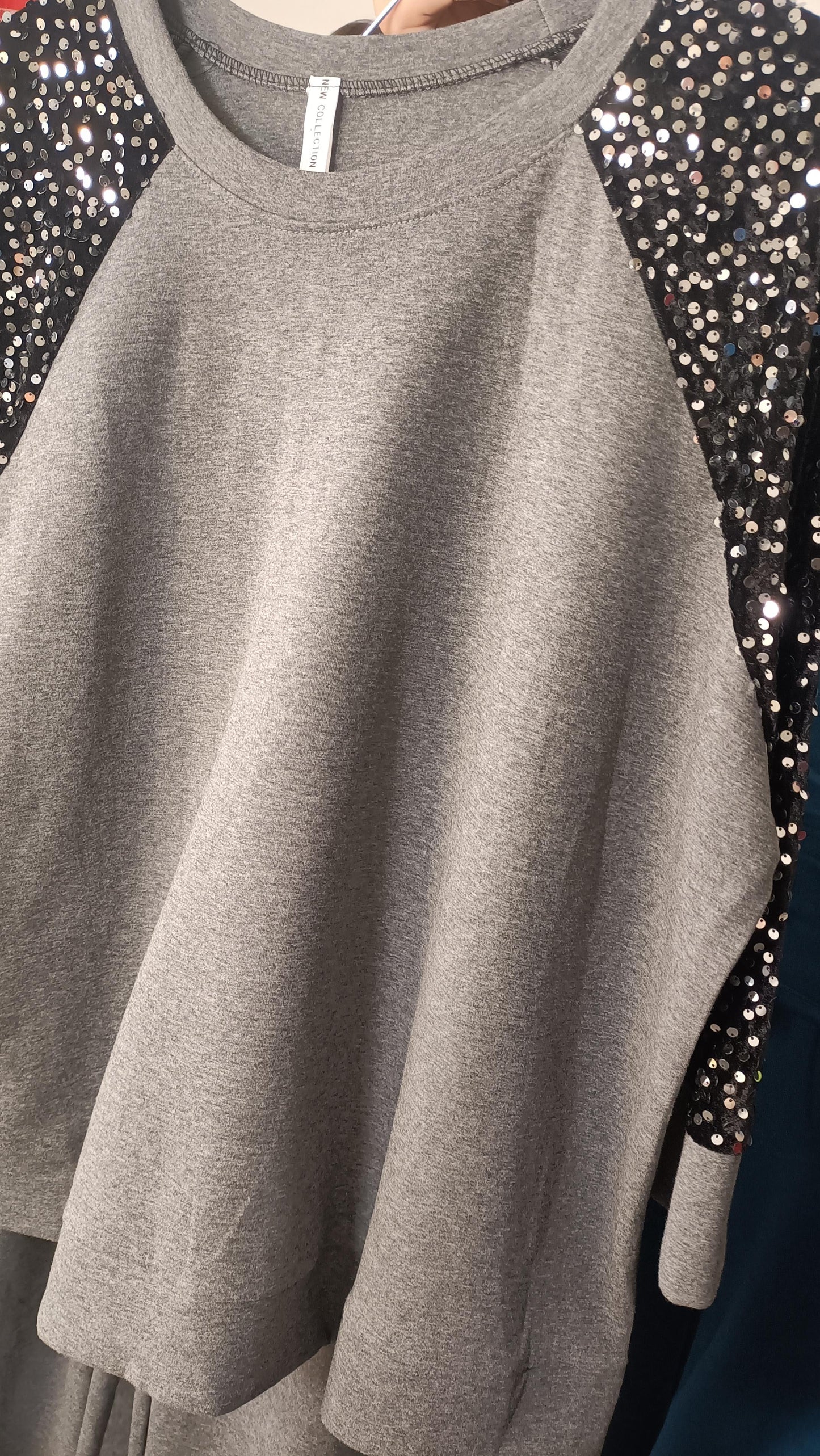 Tuta con maniche paillettes