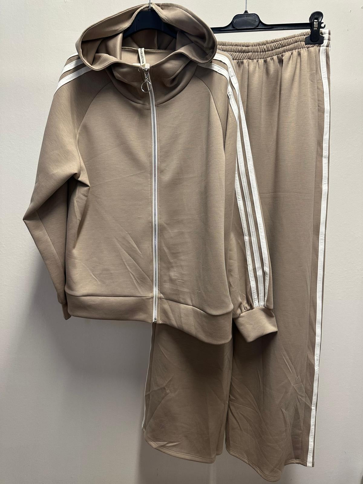 Set Tuta con zip e pantaloni palazzo con Righe Laterali – Eleganza e Comfort in un Unico Outfit!