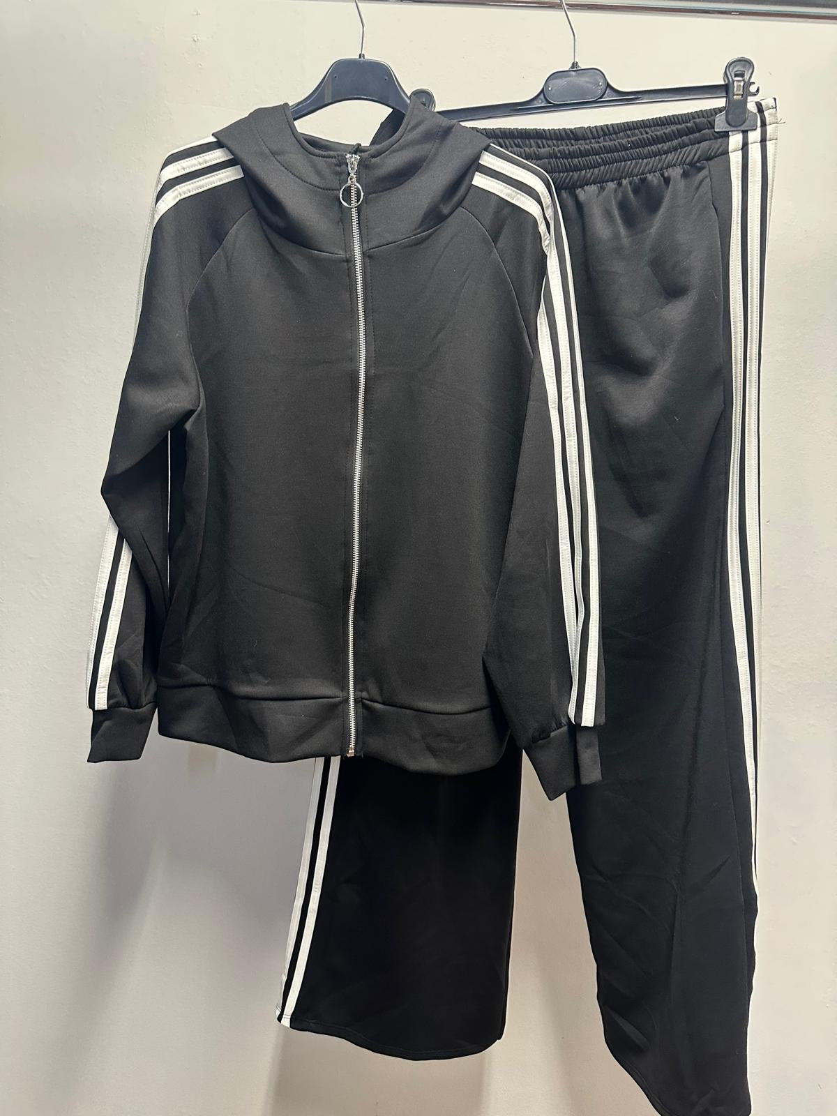 Set Tuta con zip e pantaloni palazzo con Righe Laterali – Eleganza e Comfort in un Unico Outfit!