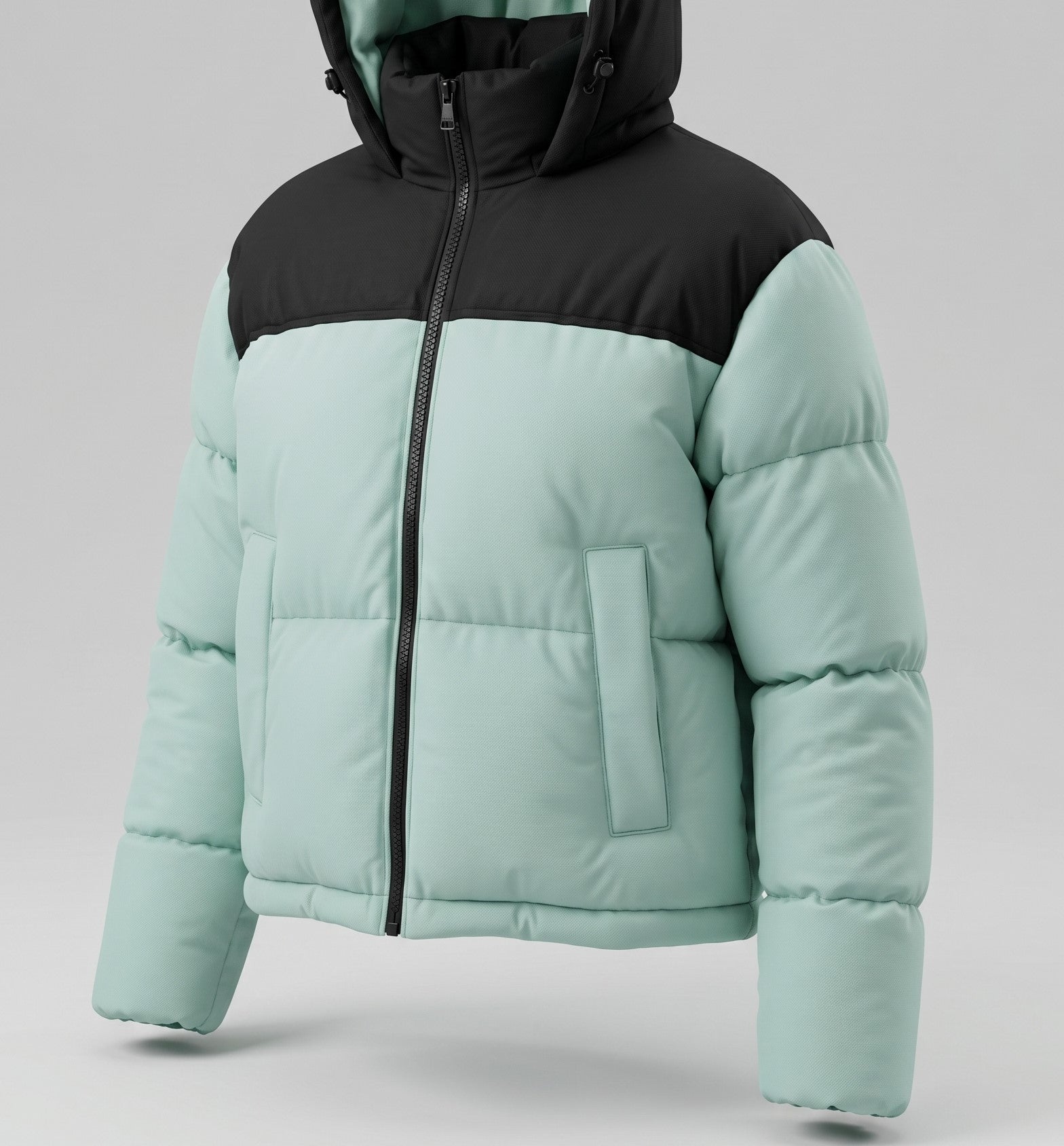 Glow on the Snow: Il Piumino Crop che unisce Stile e Calore