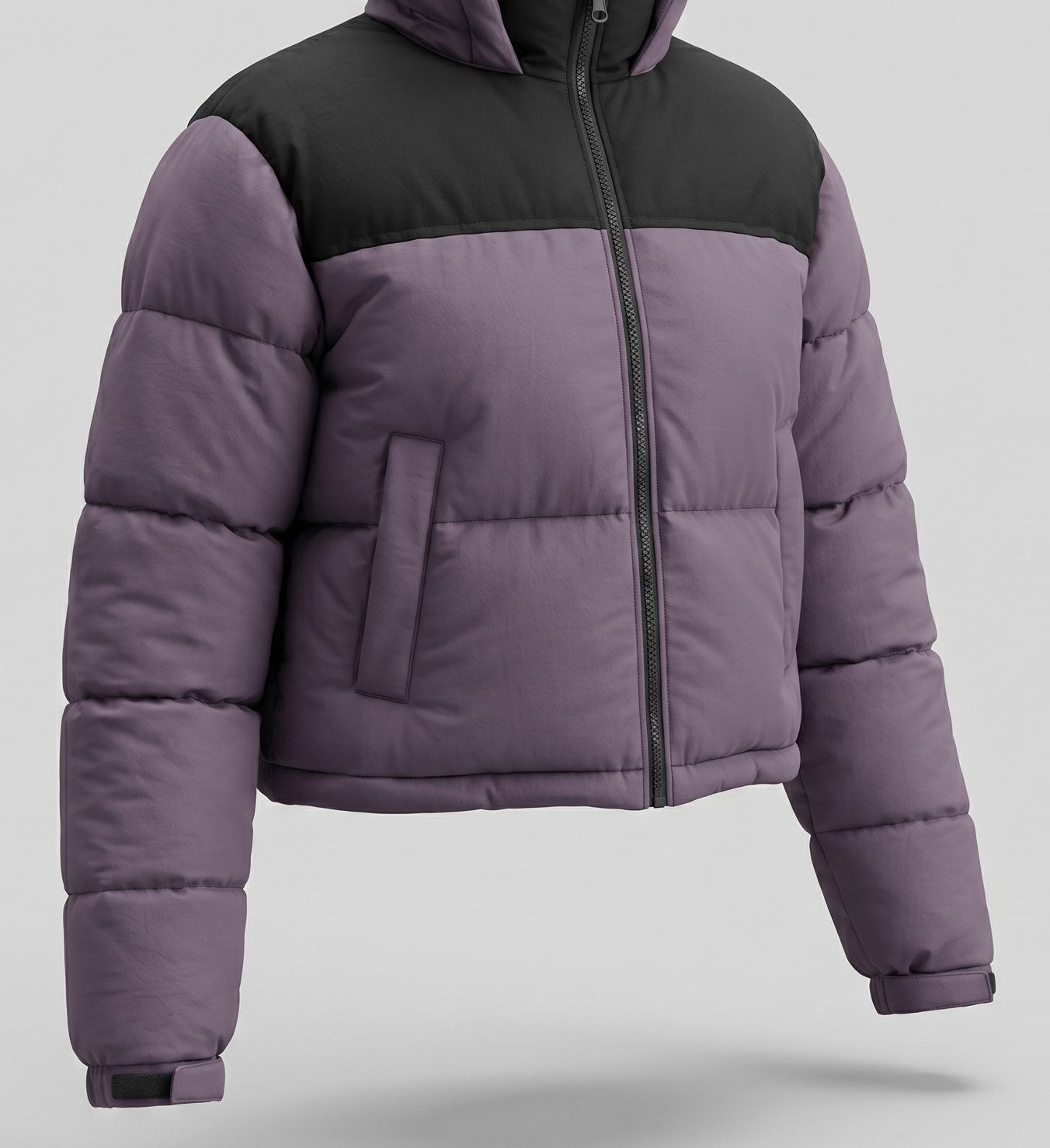 Glow on the Snow: Il Piumino Crop che unisce Stile e Calore