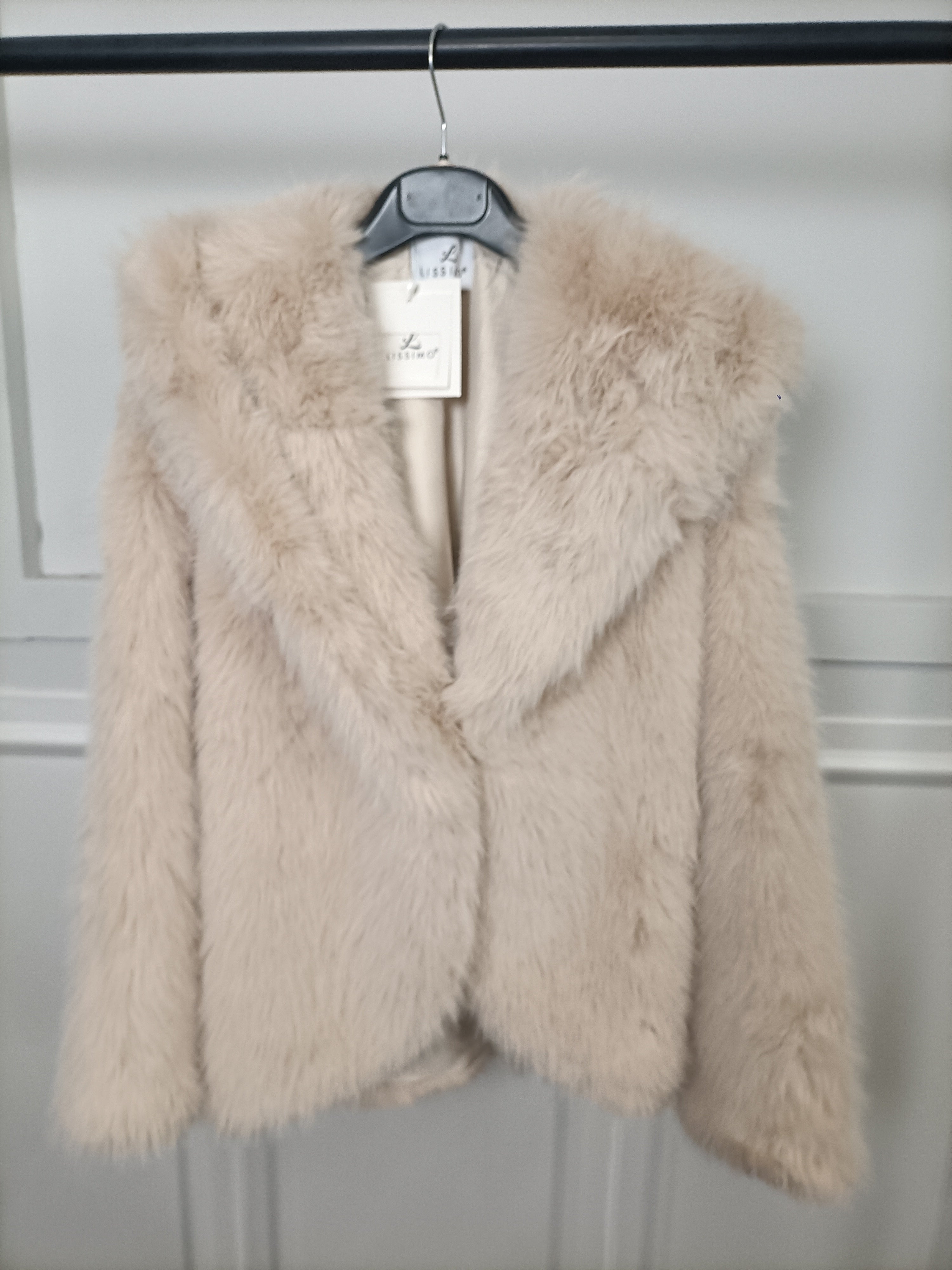 Ecopelliccia con cappuccio