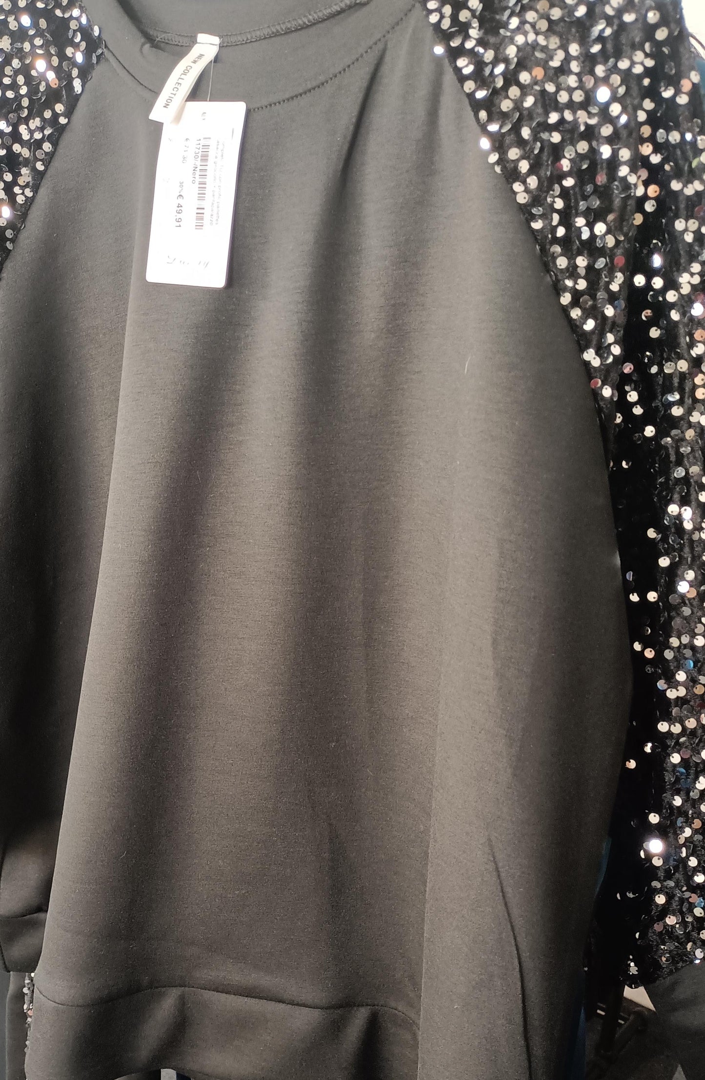 Tuta con maniche paillettes