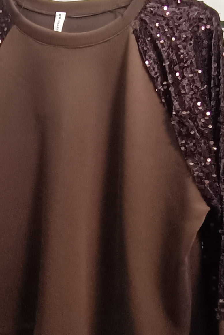 Tuta con maniche paillettes