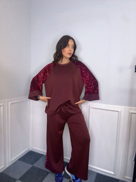 Tuta con maniche paillettes