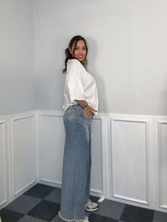 Jeans con borchiette