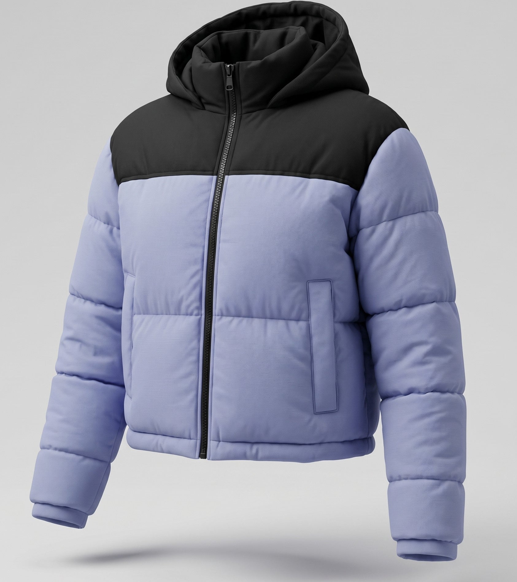Glow on the Snow: Il Piumino Crop che unisce Stile e Calore